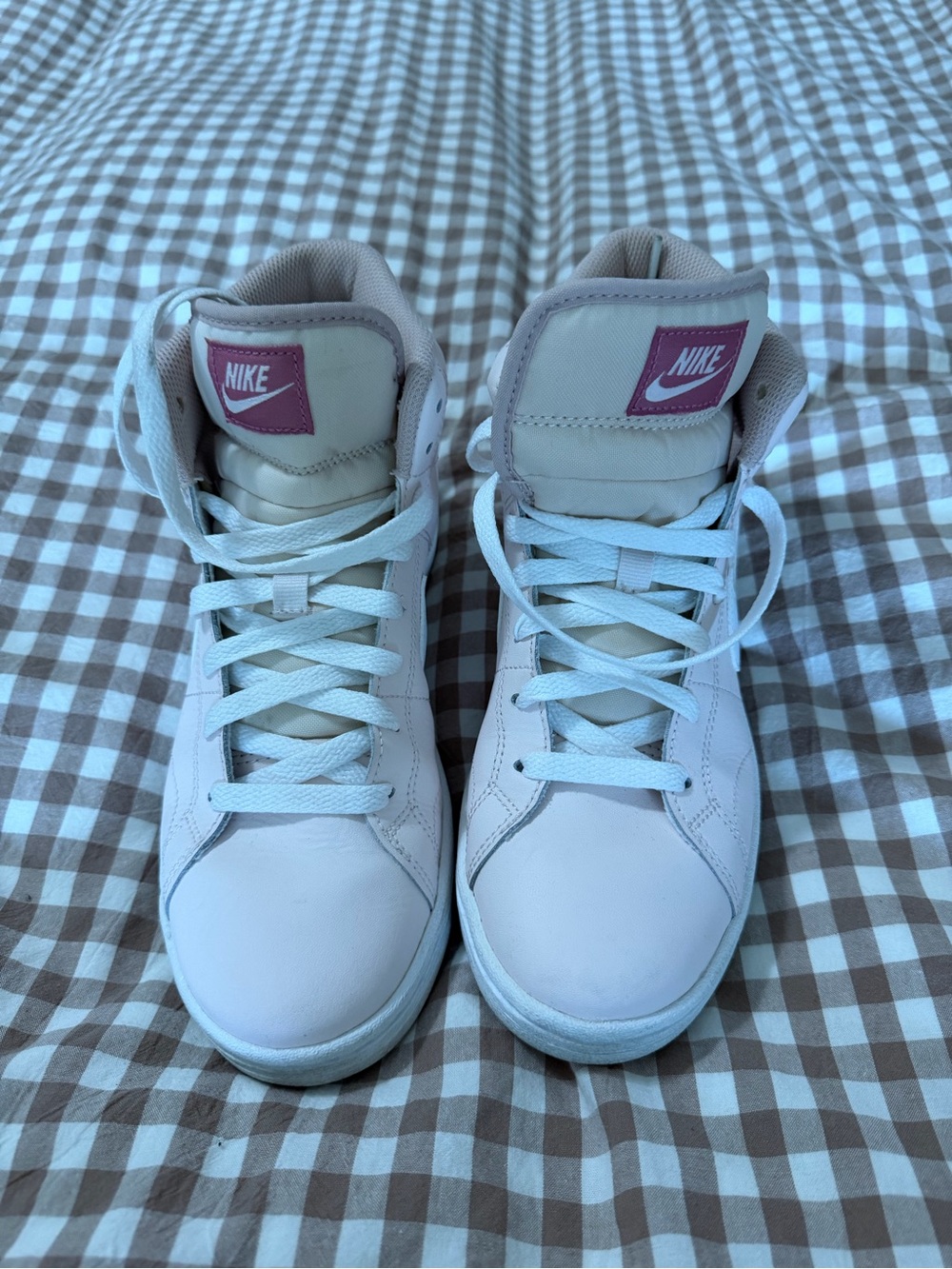 Nike Light Pink High-Top Sneakers with Pink Accent